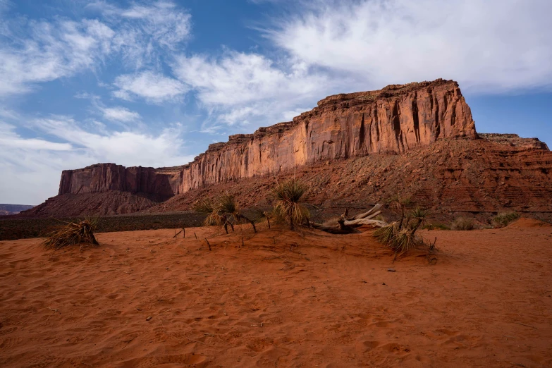 the landscape is barren with little vegetation in the foreground