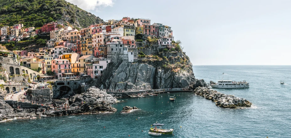 the picturesque village sits above the ocean on top of the hill