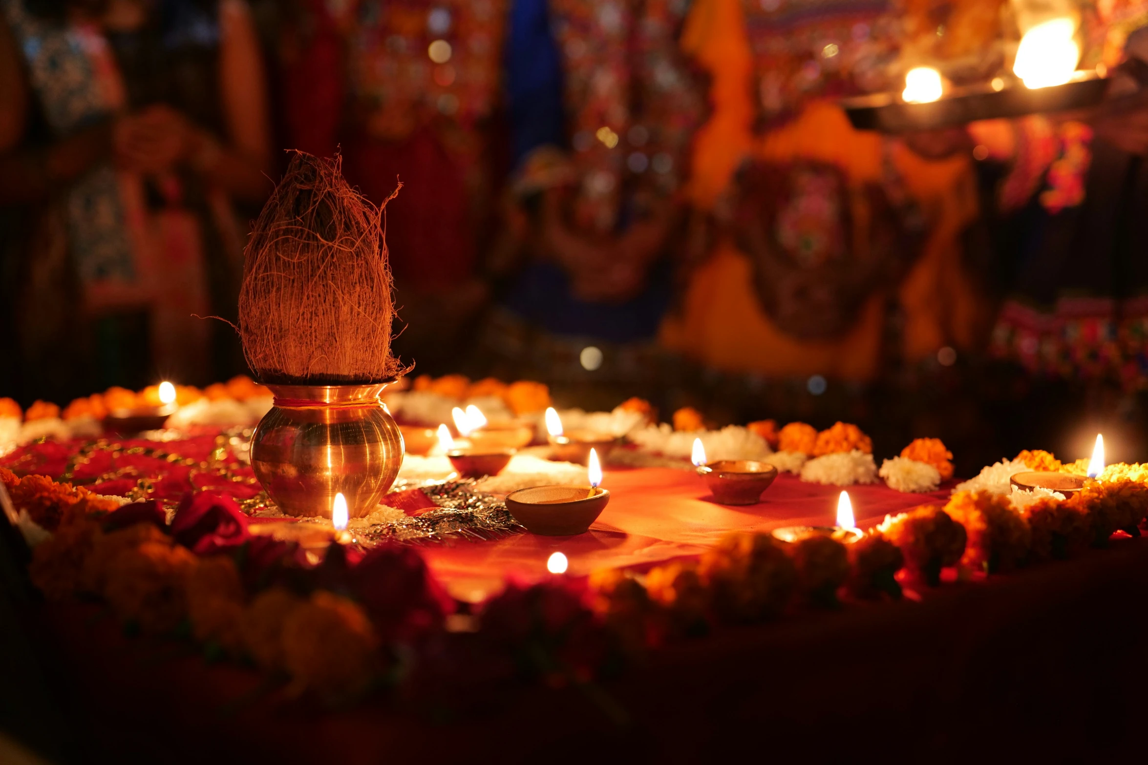 lights lit on an indian dessert with decorative items