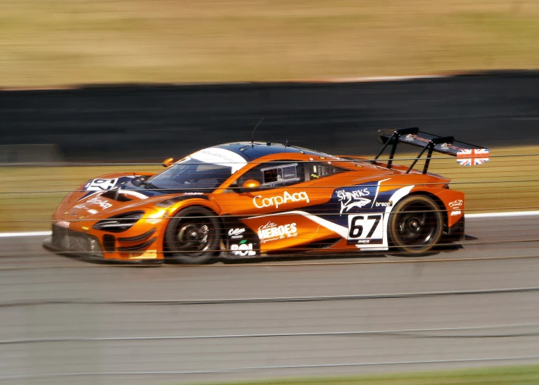 a car driving around a curve at the track