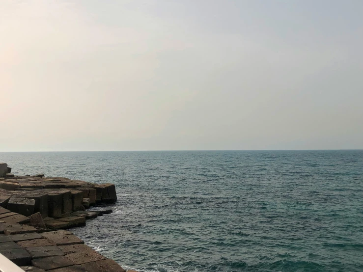 view looking out over the ocean from a ledge