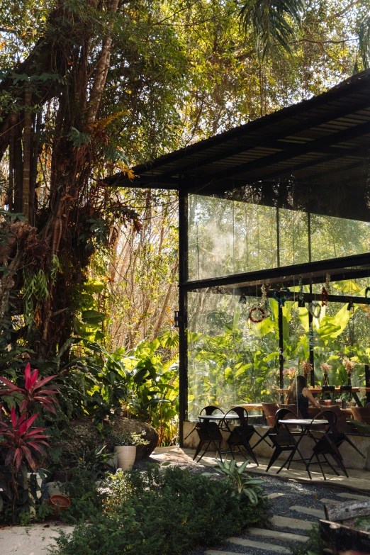 a group of people sitting at some type of outdoor patio