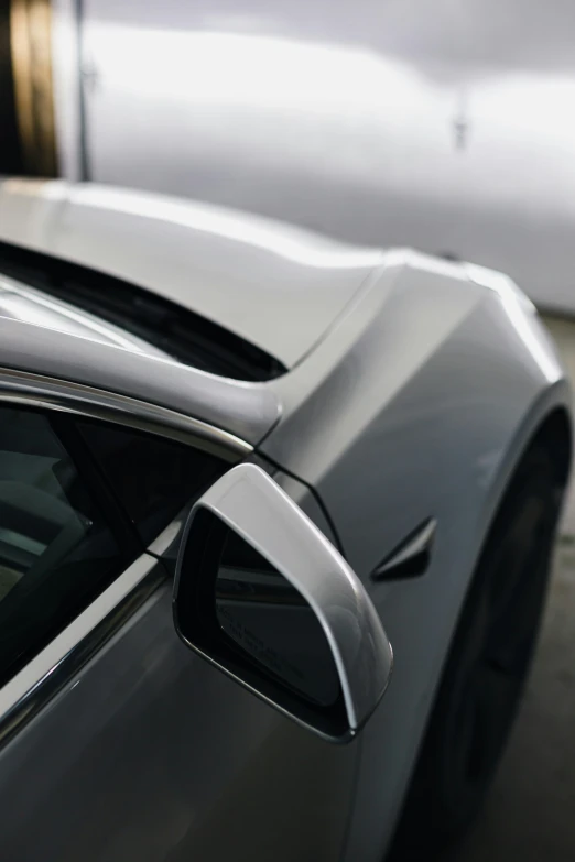 close up of the reflection of the chromed car