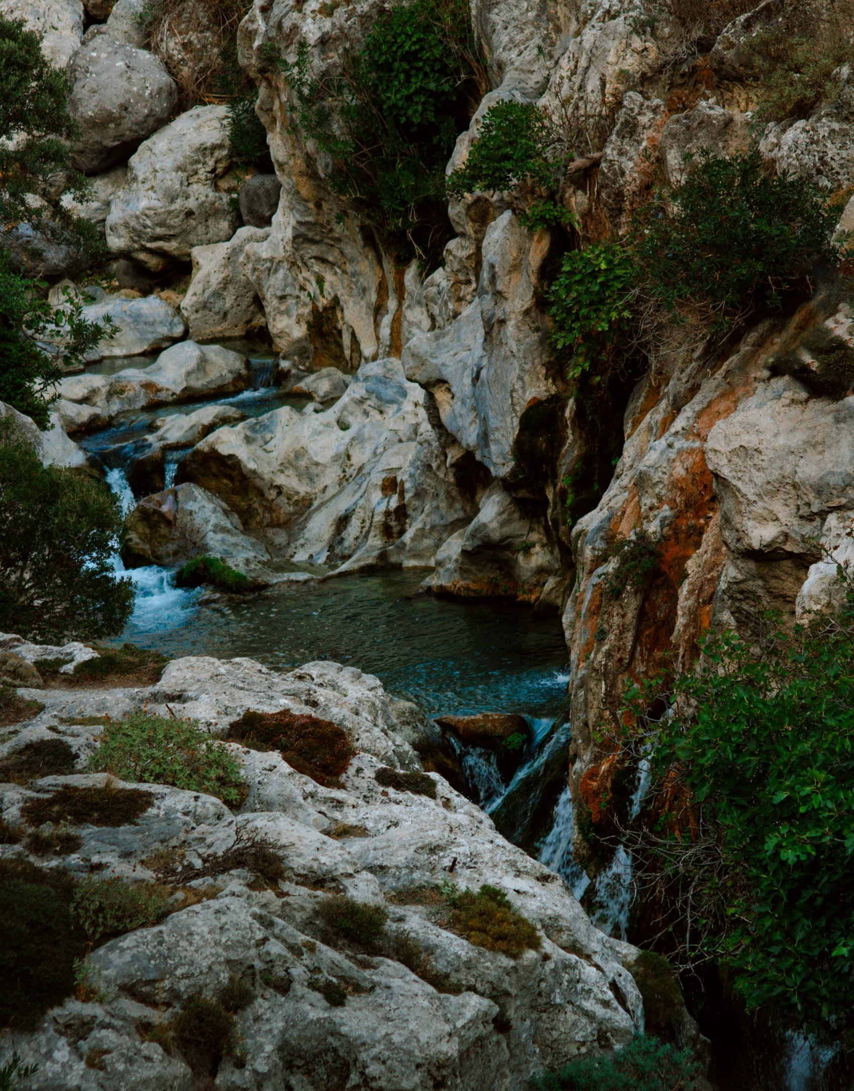 water in a small stream among large rocks