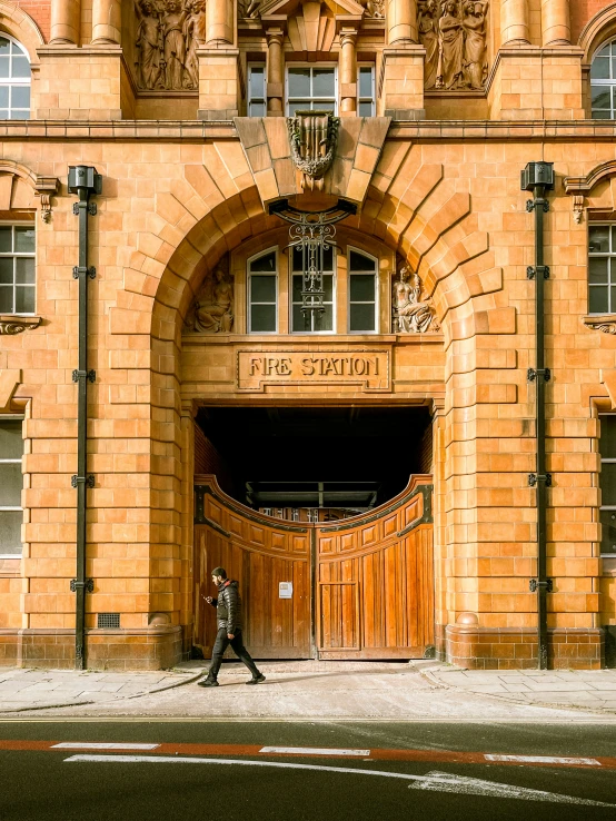 an old building has a large wooden door