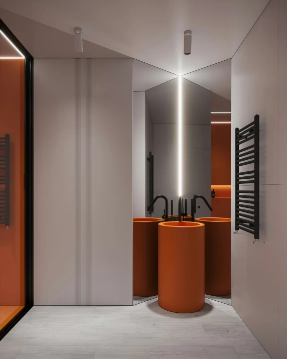 a bathroom with round sinks and orange counters