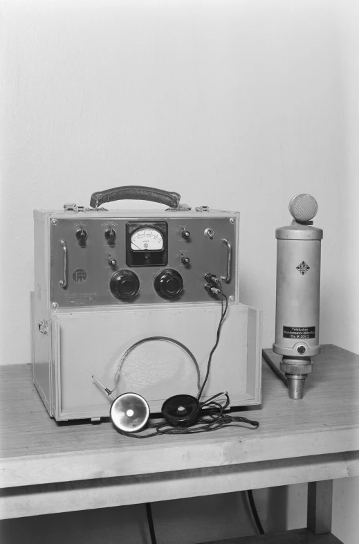 a radio and a microphone set up on a table