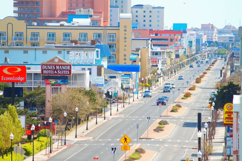 the large street of a city is very busy