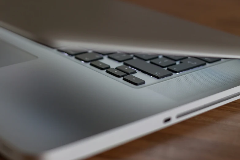 a laptop computer that is on top of a table