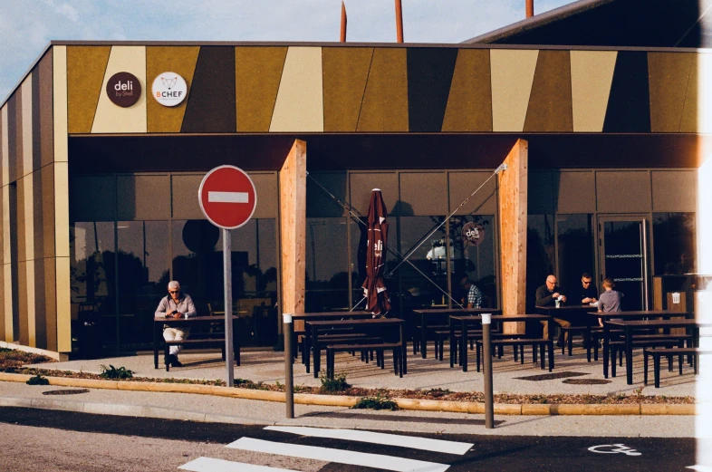 a stop sign in front of a store