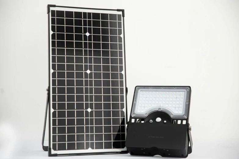 a solar panel with a cellphone in front of it