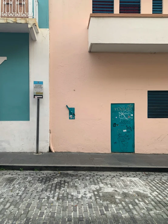 two buildings are painted white and blue in two directions