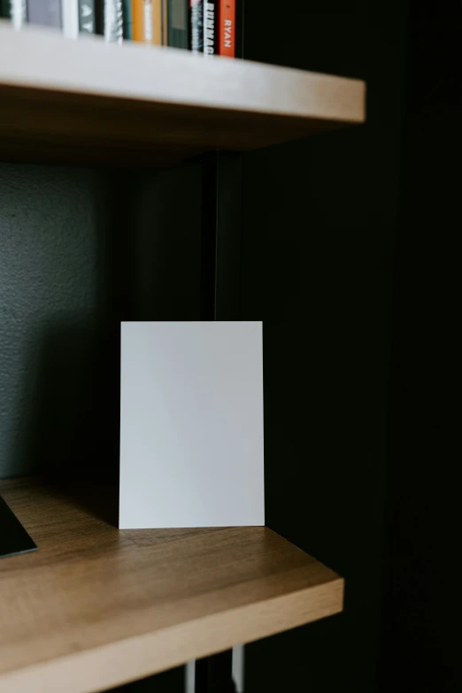 a card sitting on top of a wooden table