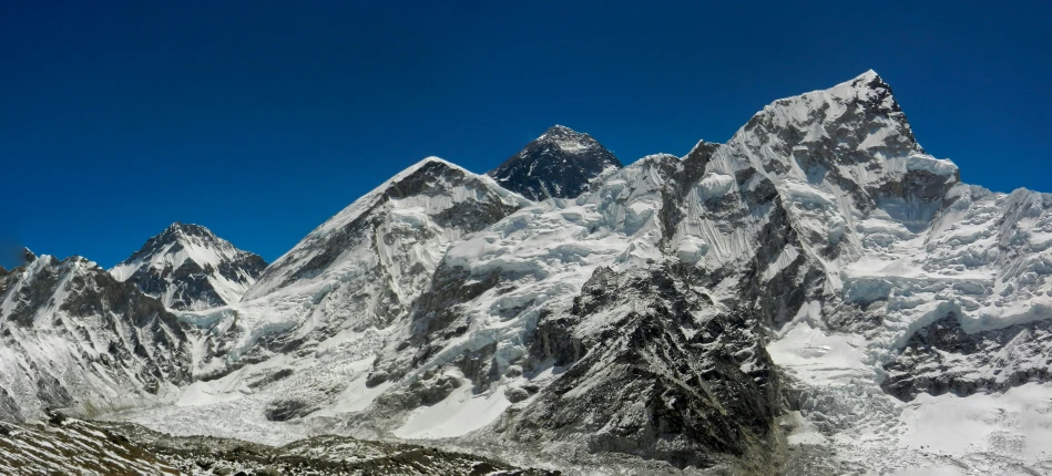 a very large snow covered mountain range