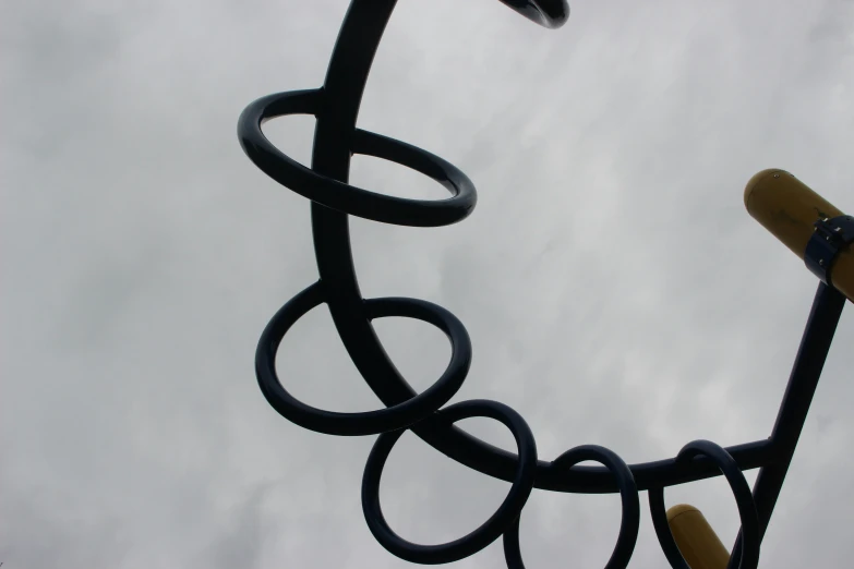 an overhead view of a sculpture with rings on it