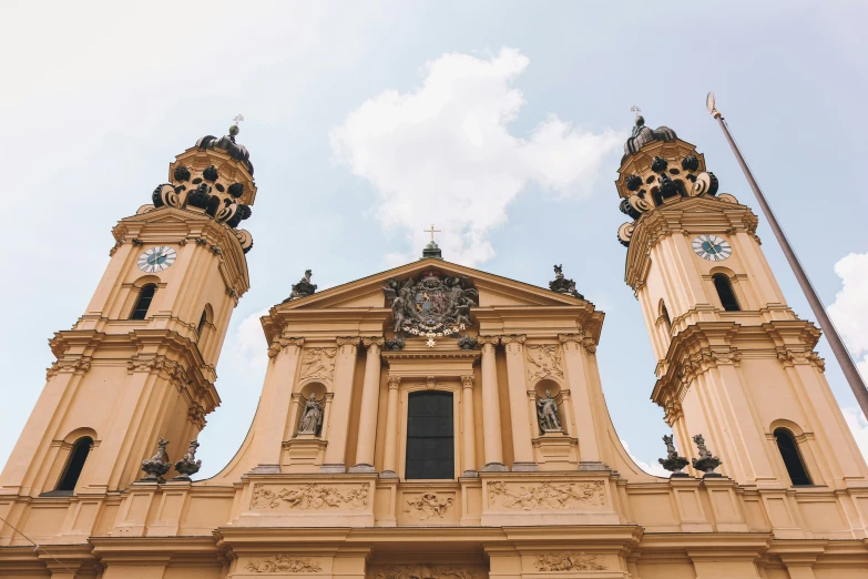 there are two very ornate towers with clocks on them