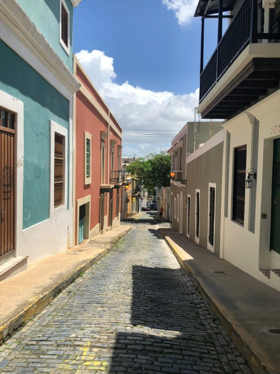 an old town street with colorful brick buildings