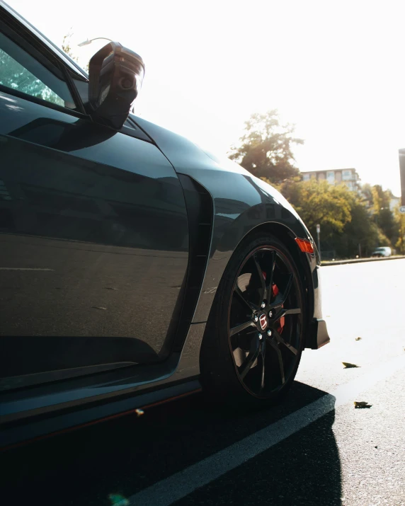 a sports car parked on the side of the street