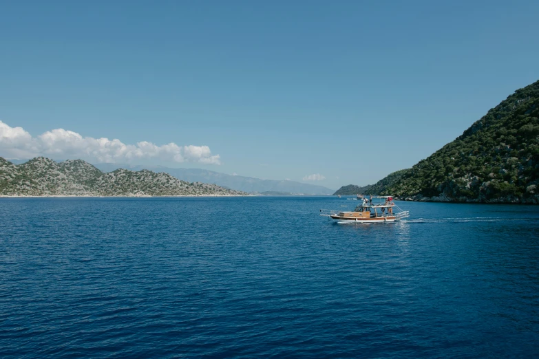 two people in a boat out on the water