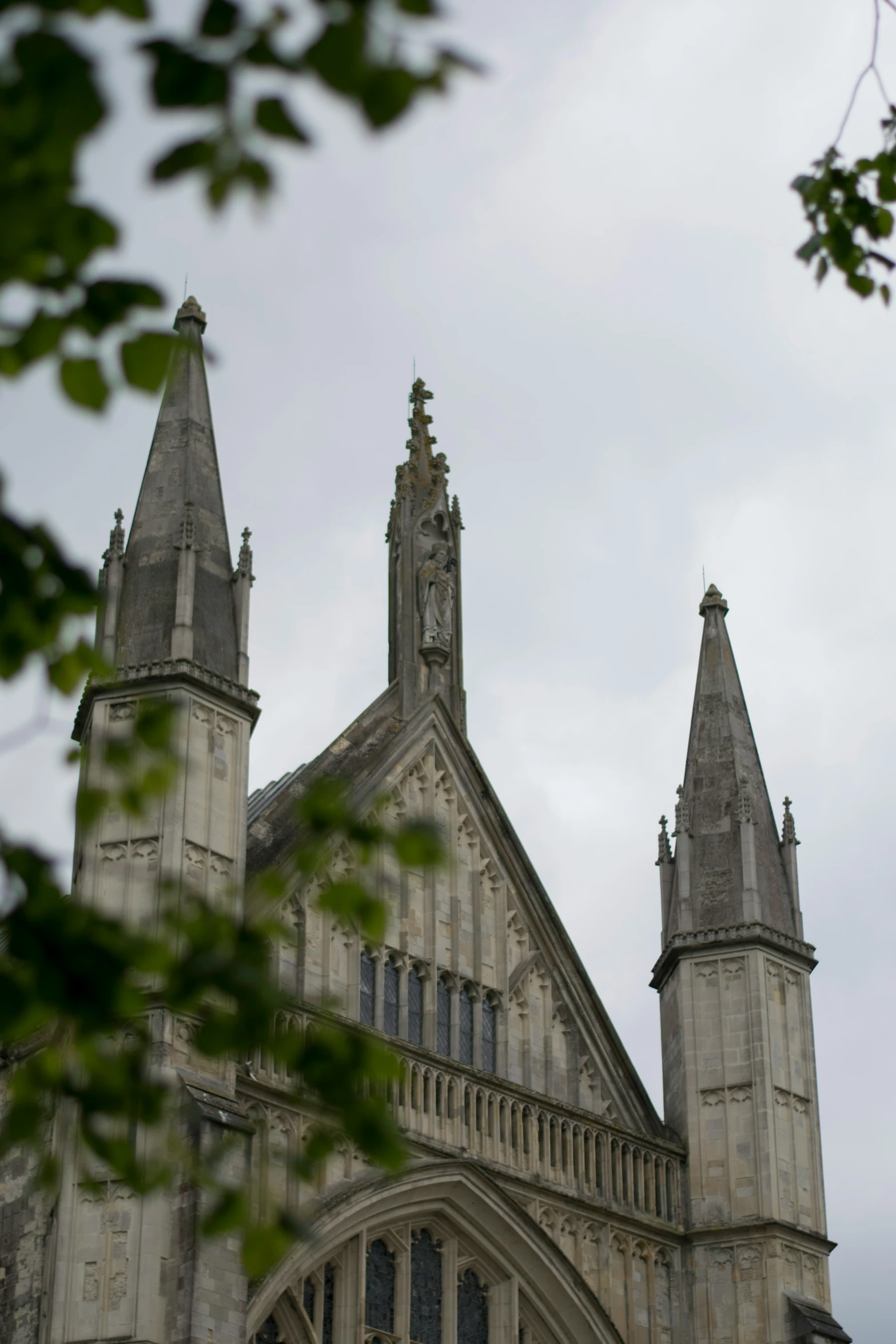 a large building with tall spires on the top