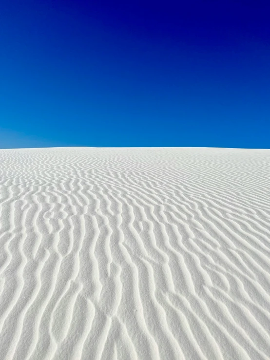 the white sands are almost covering the entire of the sand