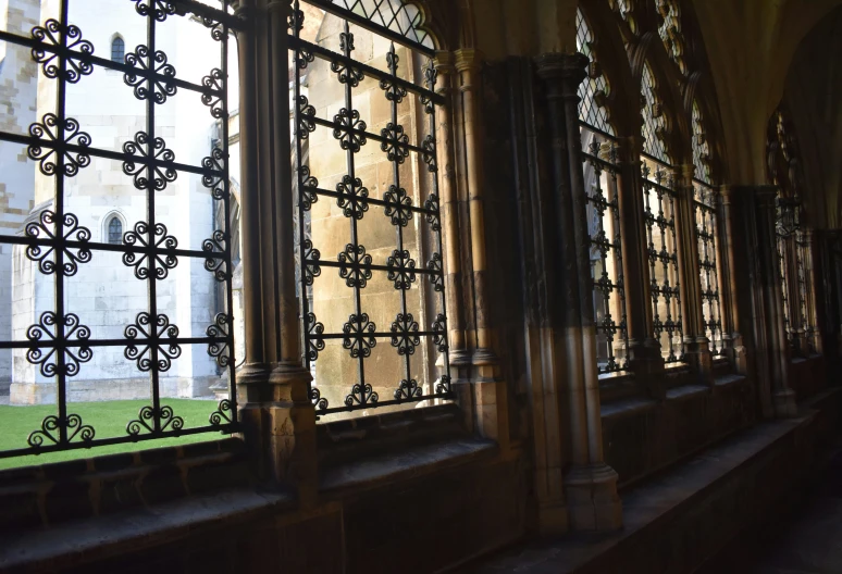 old window with metal bars in the foreground