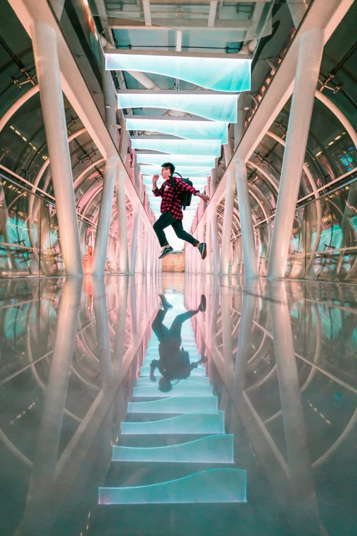 man jumping in air inside a modern building