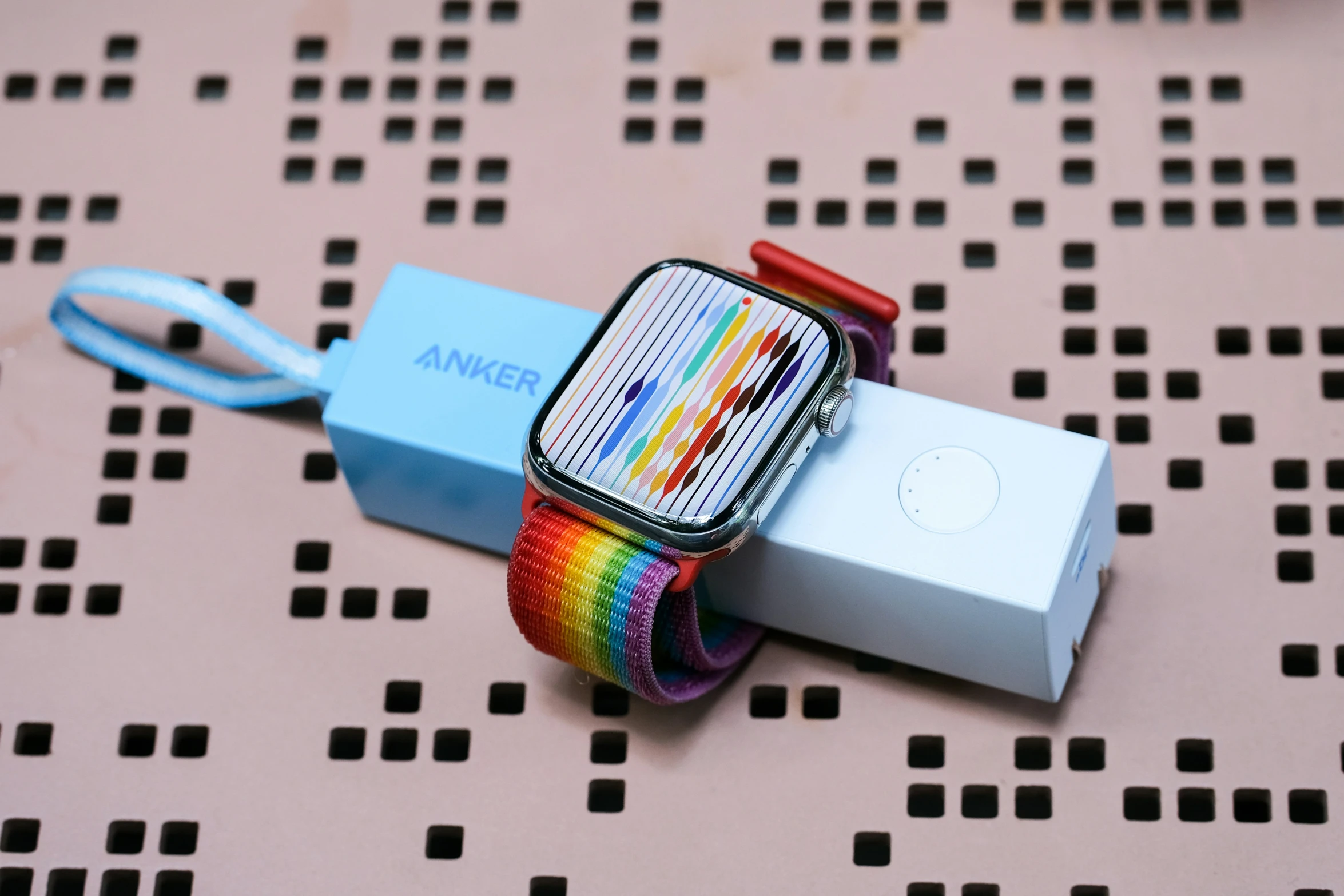 a box with some colorful cords on top of it