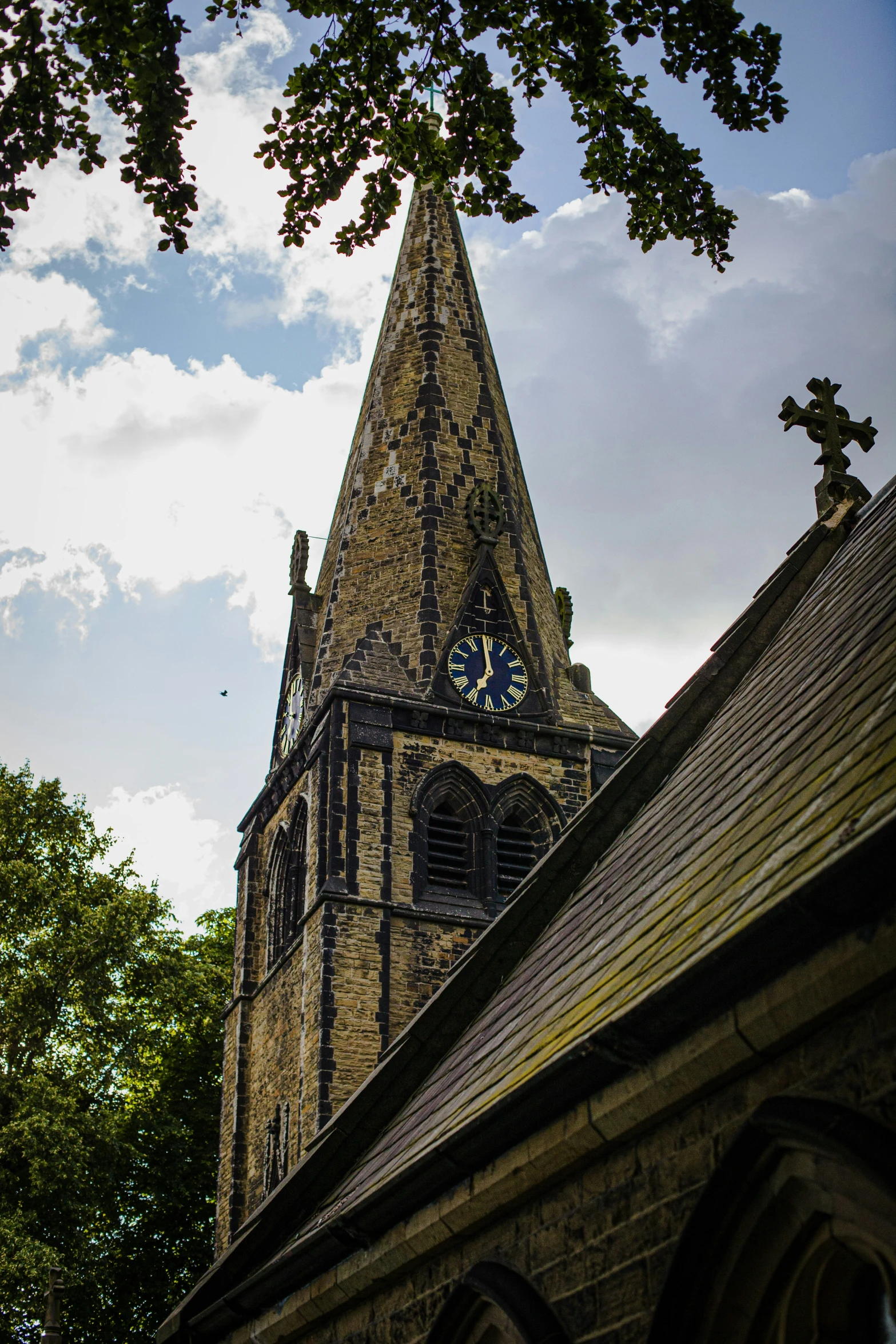 a view of a church tower from the outside