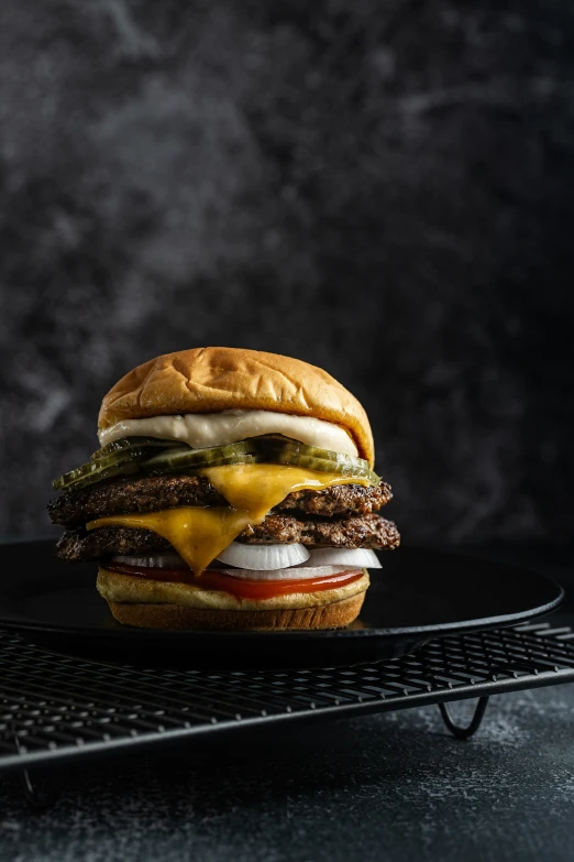 a very tasty looking cheeseburger with toppings