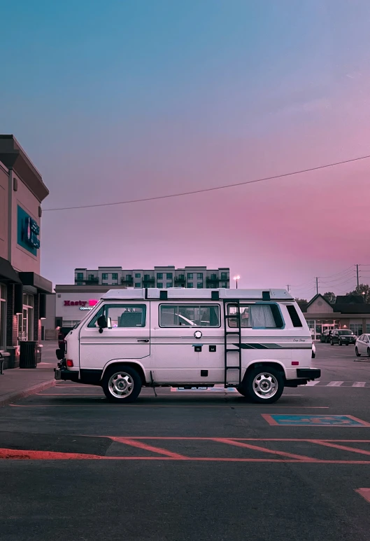 a white truck parked in a parking lot