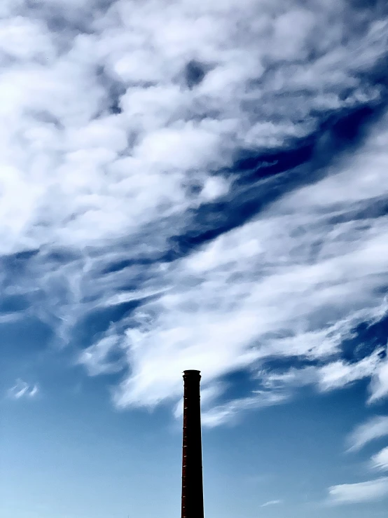 a tall black tower towering into the sky