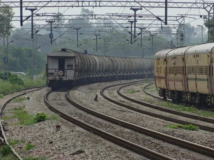 a train yard full of different train cars