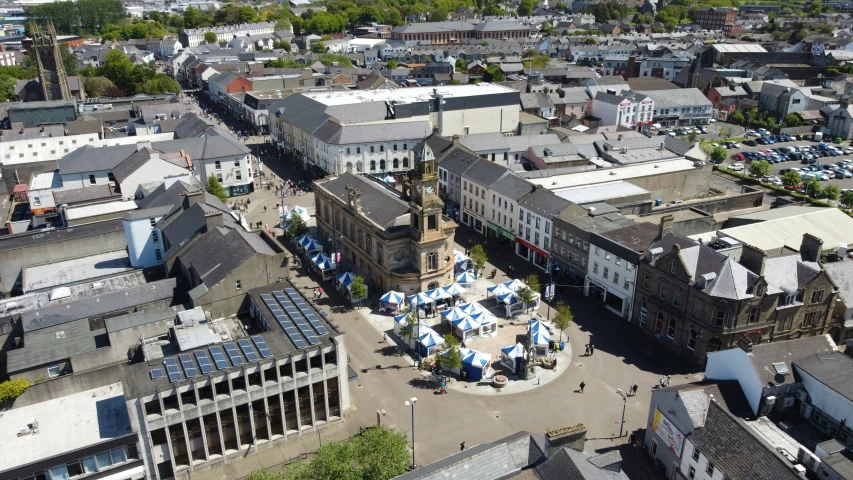 the top floor has blue tents set up