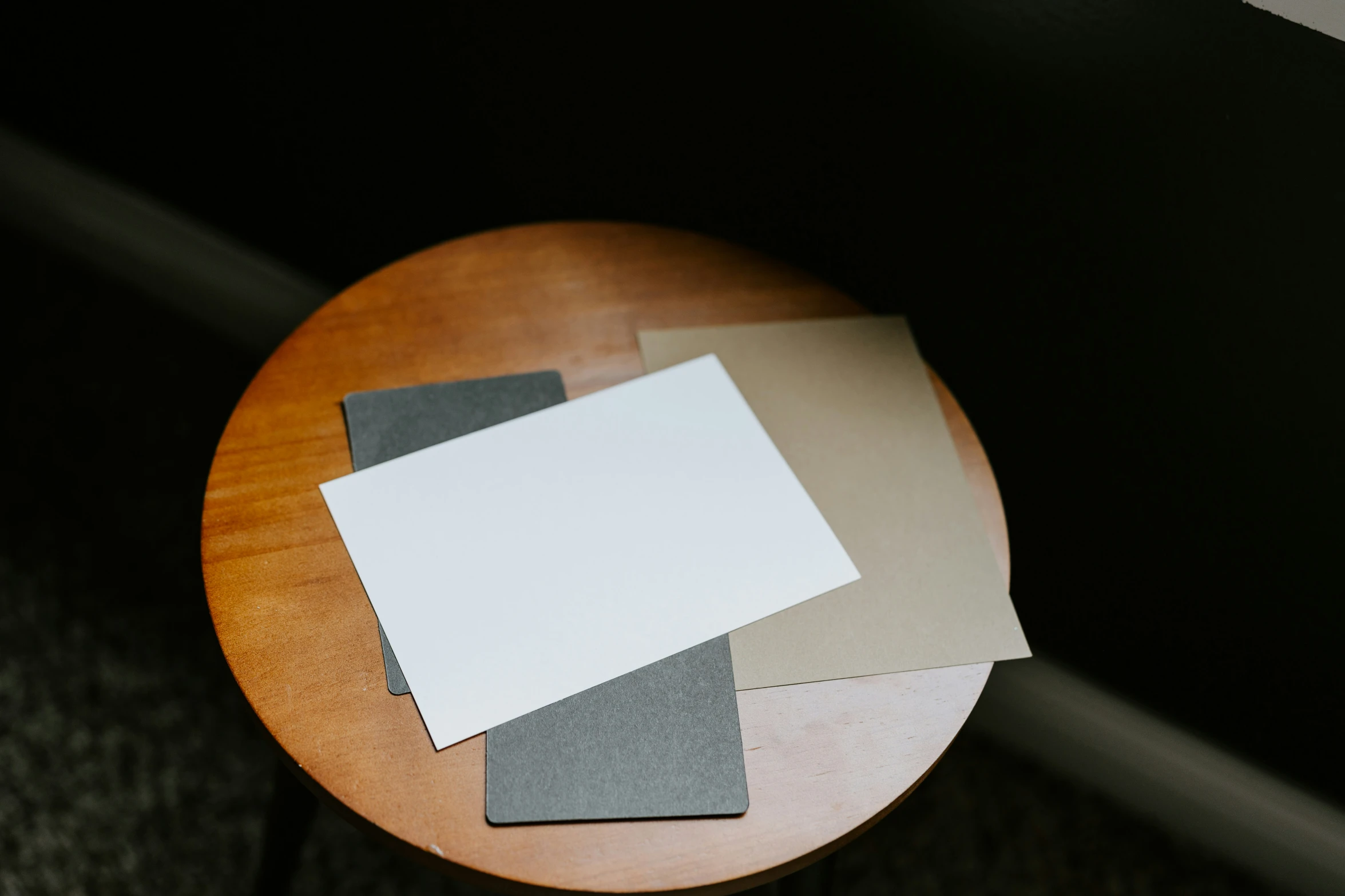 a table with four pieces of paper on top of it