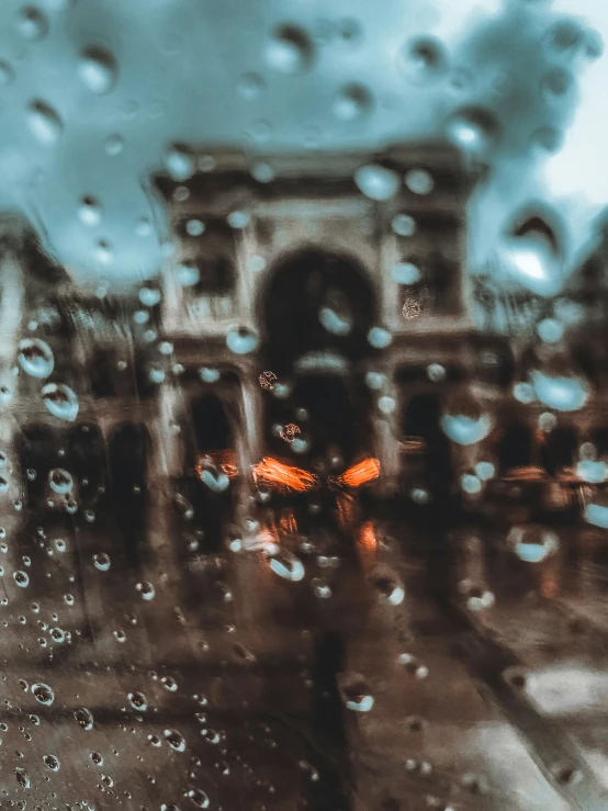 a rainy day with rain drops on the windshield