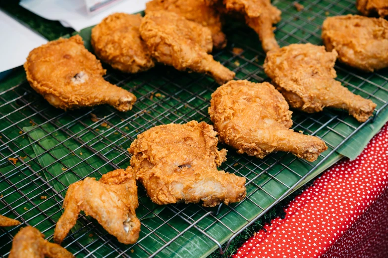 a metal rack covered in chicken nuggets