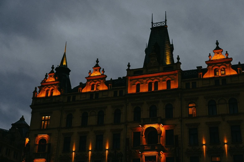 a very tall building lit up in the night