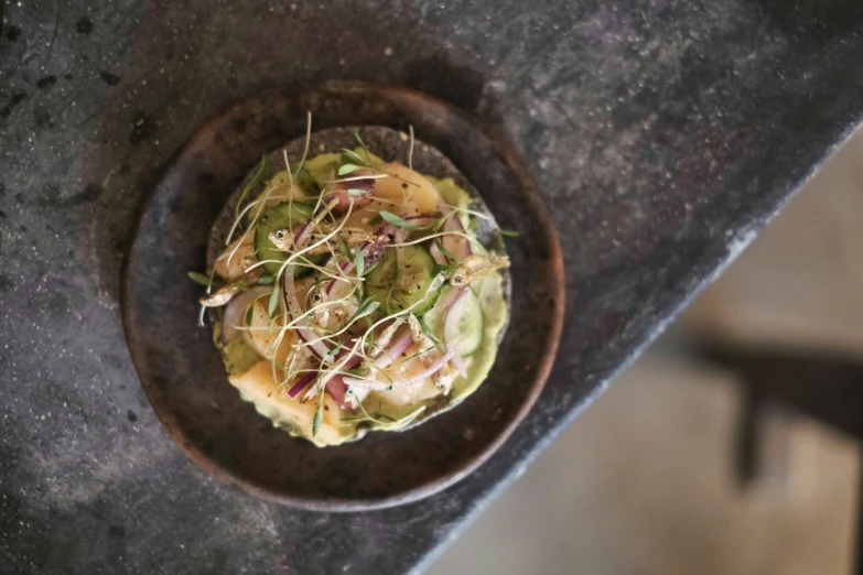 an arrangement of food is served in a bowl