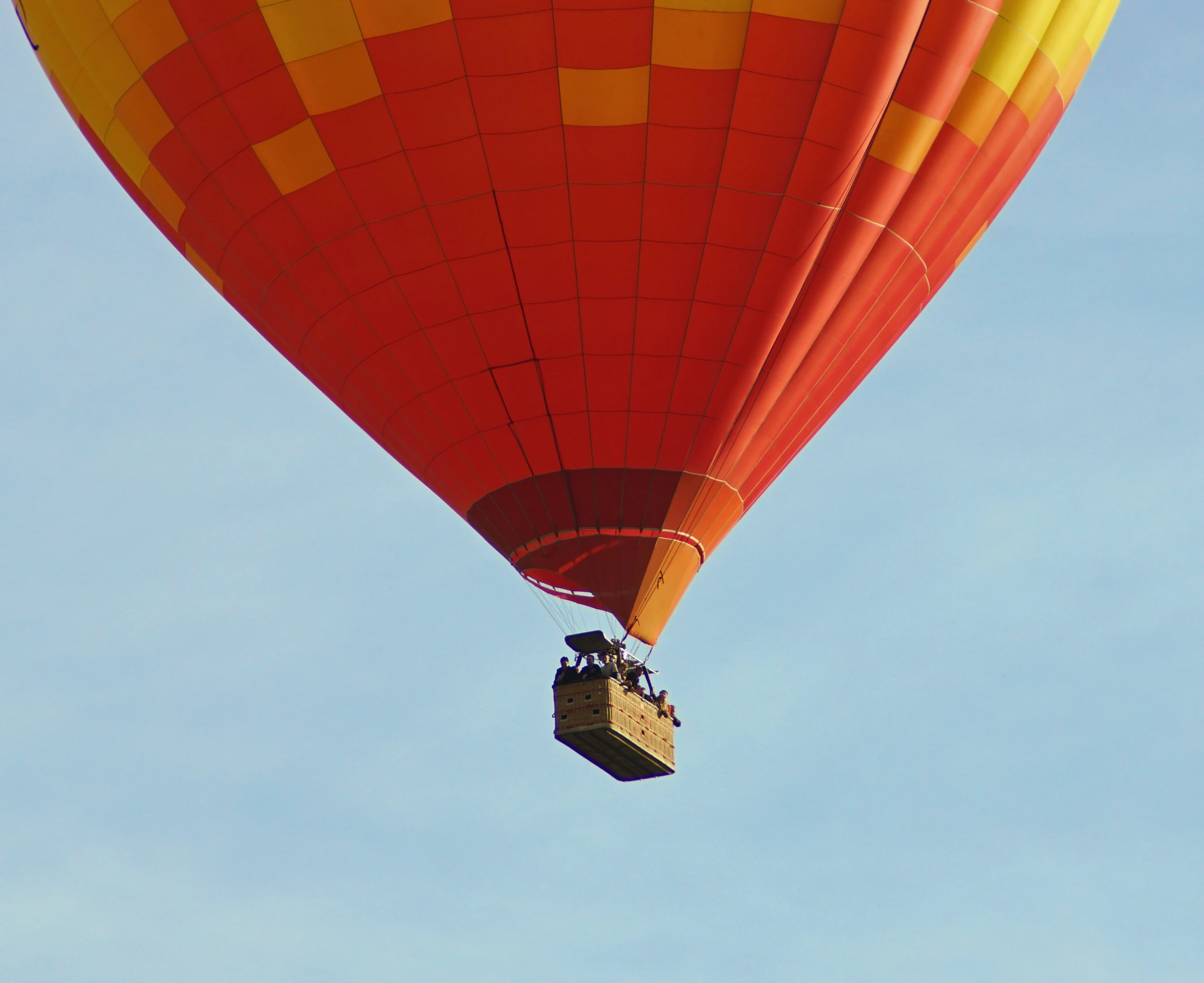 a large orange and yellow  air balloon