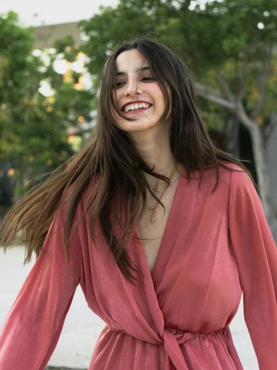 a beautiful young woman with long brown hair