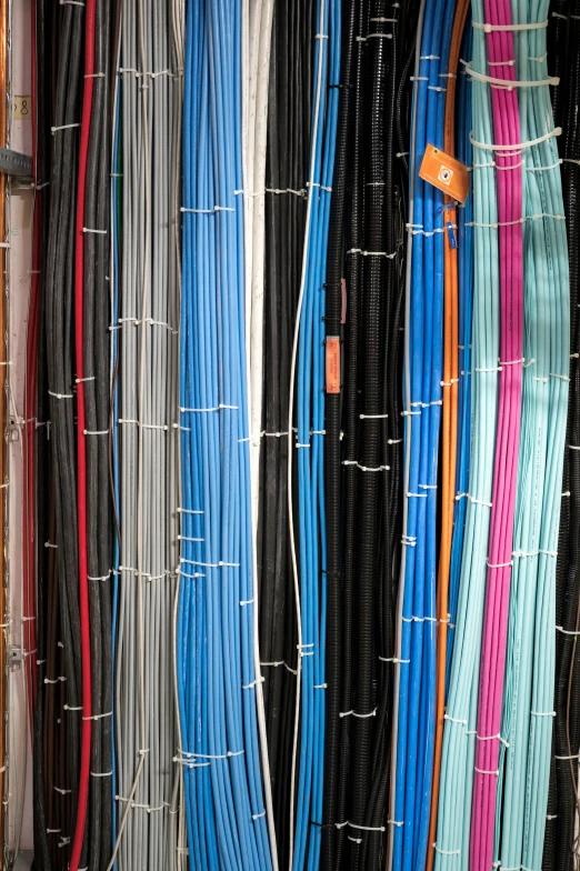 a wall full of various wires for display