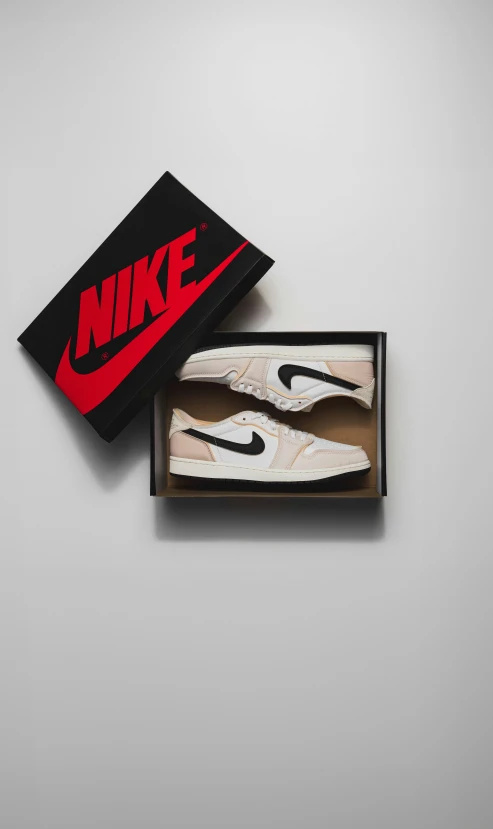 the shoe box has a black and white nike tie