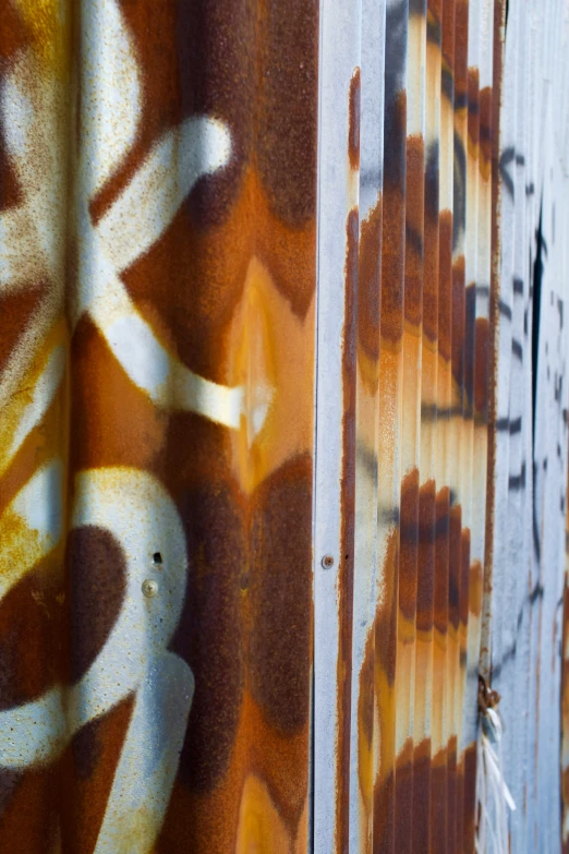 a close up of graffiti and wall paint