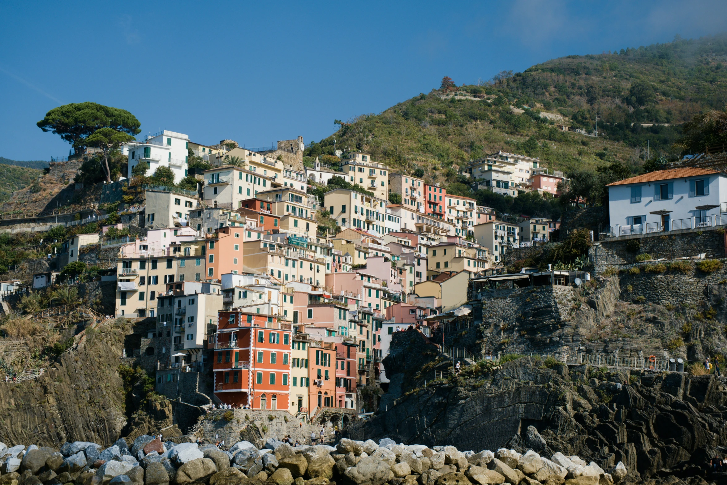 an image of colorful buildings on a mountain