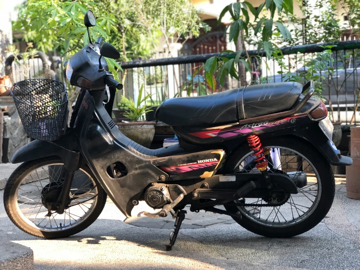 a black motorcycle parked on the street