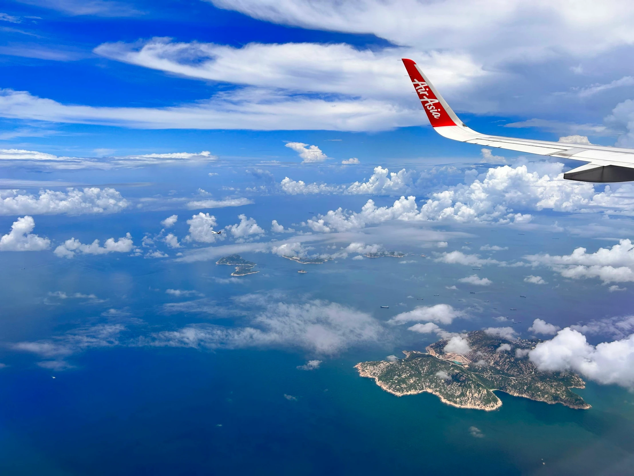 a view from an airplane window of a large body of water