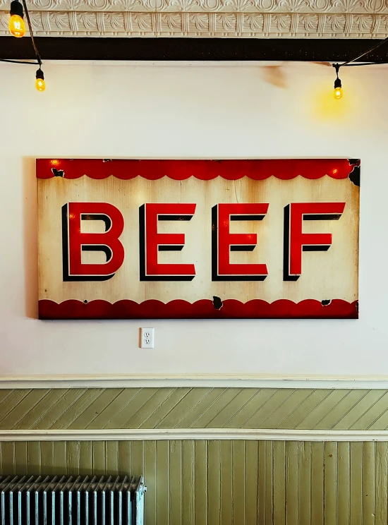 the restaurant sign is on display in the restaurant