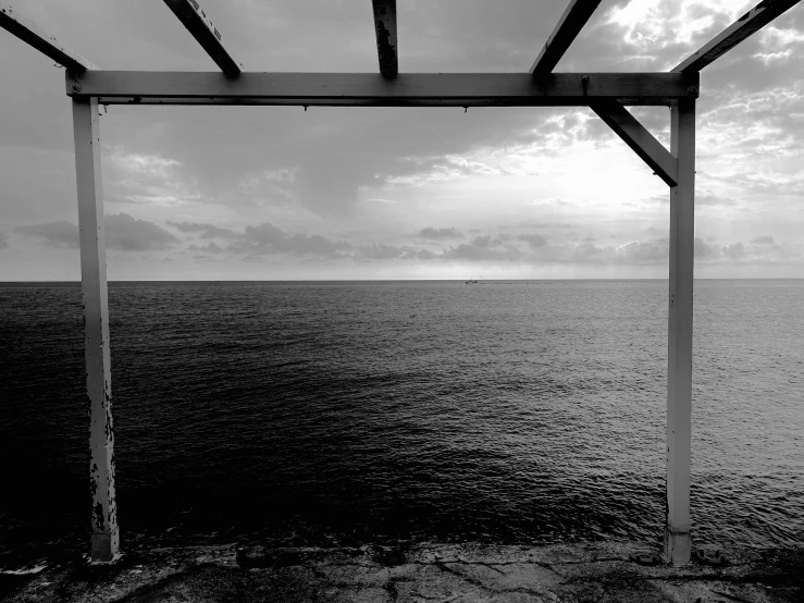 an image of the ocean from a dock