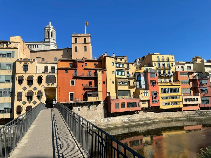 a bridge that has a walkway between two buildings